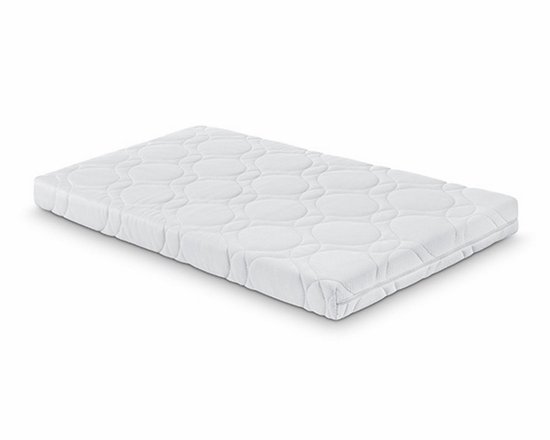Wit babymatras met cirkelpatroon op de hoes, met rits aan de zijkant.