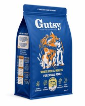 Blauwe zak Gutsy hondenvoer 'White Fish & Insects for Small Adult' met afbeeldingen van honden, bergen en vis.