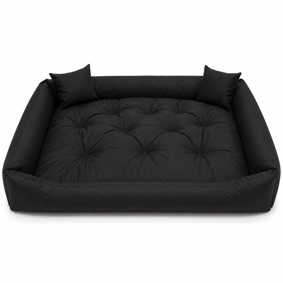 Zwart hondenbed met opstaande randen, twee kussentjes en een doorgestikt matras.