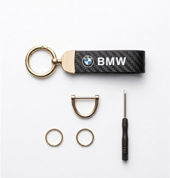 Porte-clés BMW avec motif carbone, détails dorés, anneau en D, deux petites anneaux et un tournevis.