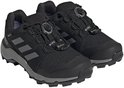 Paar zwarte wandelschoenen met grijze zolen en een BOA-vetersysteem.
