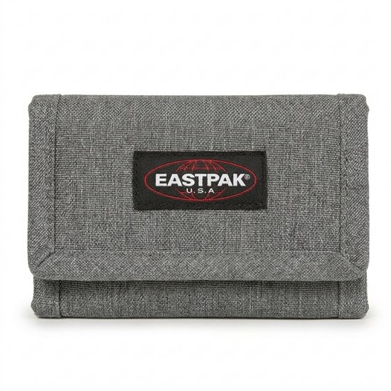 Porte-clés Eastpak gris en tissu avec logo Eastpak noir et rouge.