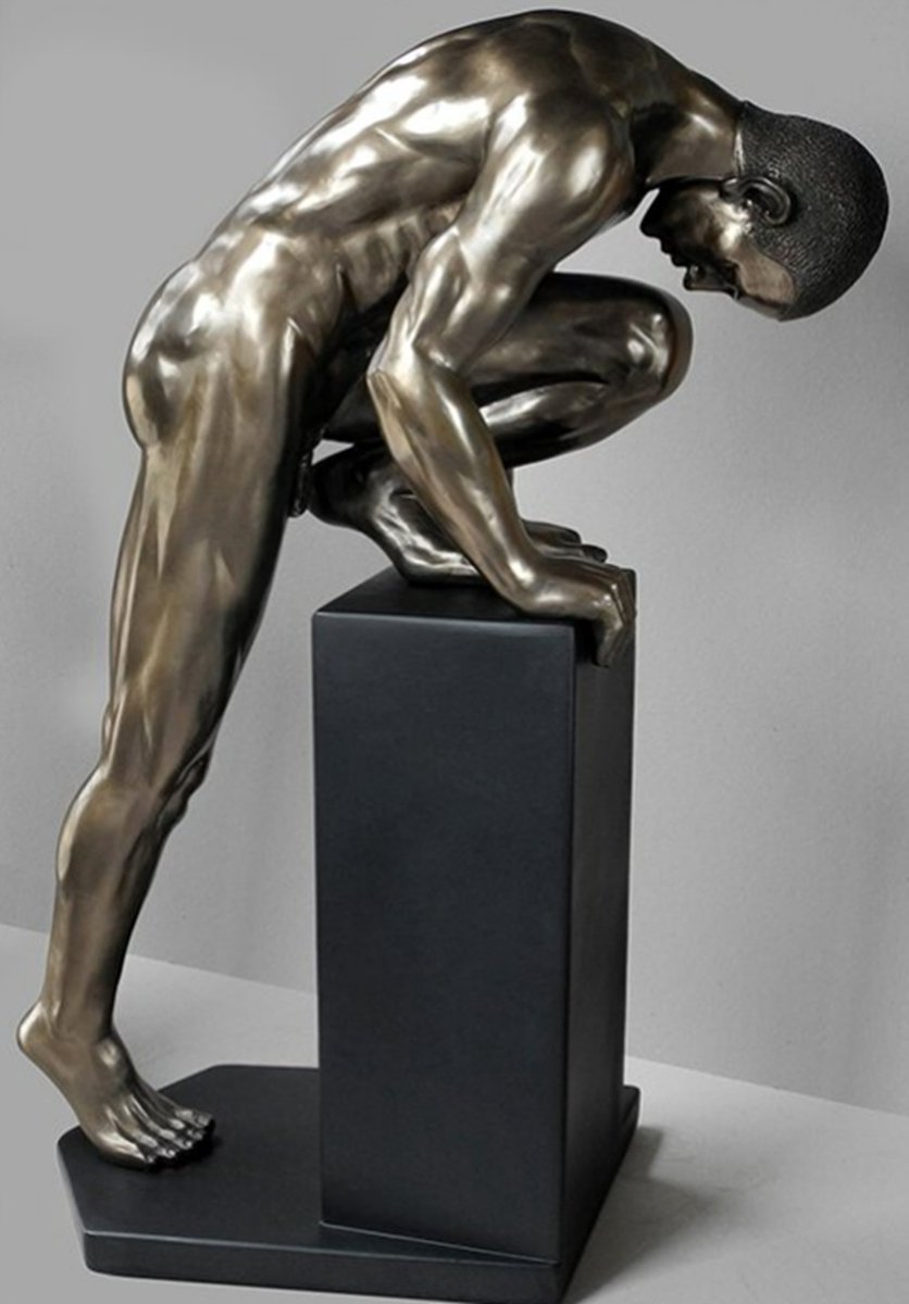 Beeldje brons - strekkende man - Hoogte 34 cm