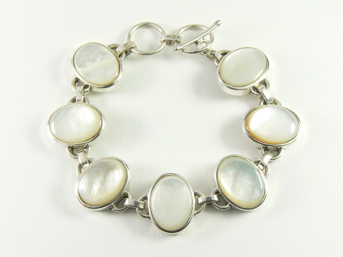 Zilveren schakelarmband met parelmoer