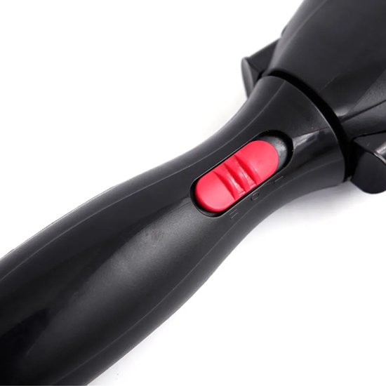 Zwarte automatische haarvlechtmachine met rode schakelaar en tanden aan de voorkant.