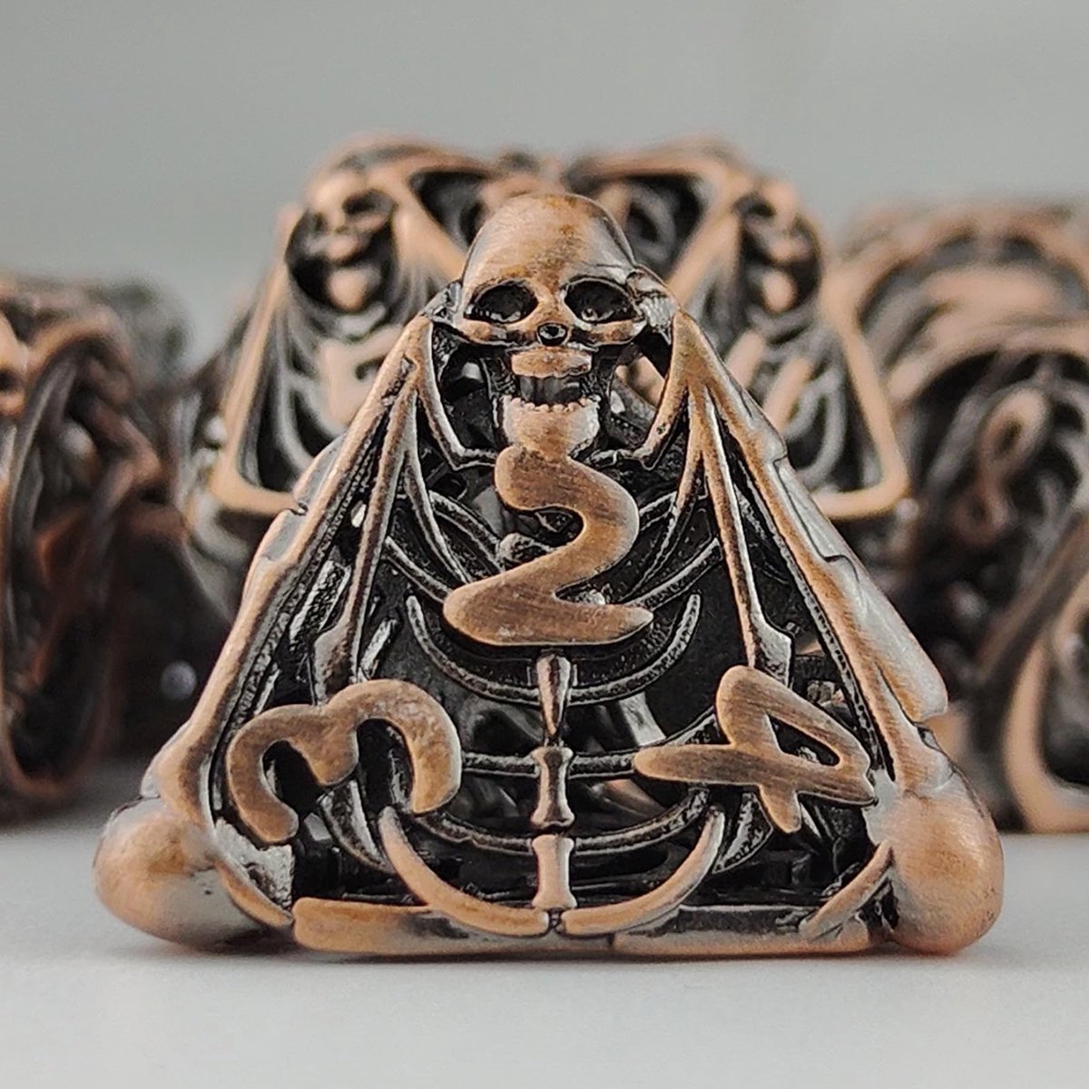 DND dobbelstenen set 7-delige - metalen veelvlakkige dobbelstenen - hollow skull ontwerp - perfect voor rollenspellen - ShopVlot