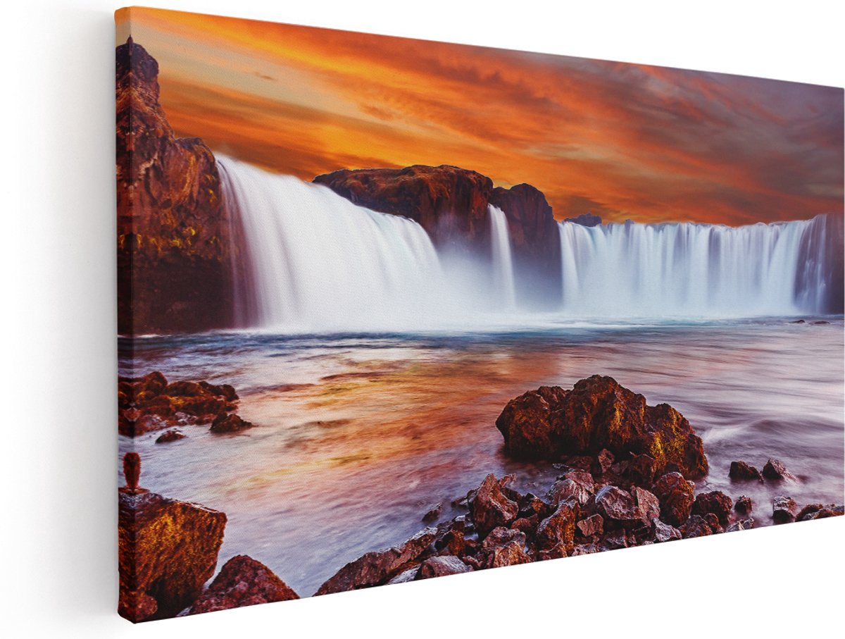 Artaza Canvas Schilderij Waterval Bij Een Oranje Hemel - 180x90 cm - Groot - Wanddecoratie Woonkamer - Schilderijen - Muurdecoratie