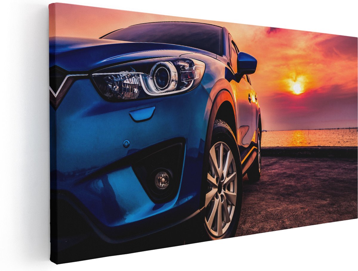 Artaza Canvas Schilderij Blauwe Sportwagen Auto Bij Zonsondergang - 180x90 cm - Groot - Wanddecoratie Woonkamer - Schilderijen - Muurdecoratie