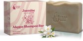 Groene Fadel jasmijn aleppo shampoo bar, handgemaakt met olijf- en laurierolie. Verpakking met jasmijnbloesem.