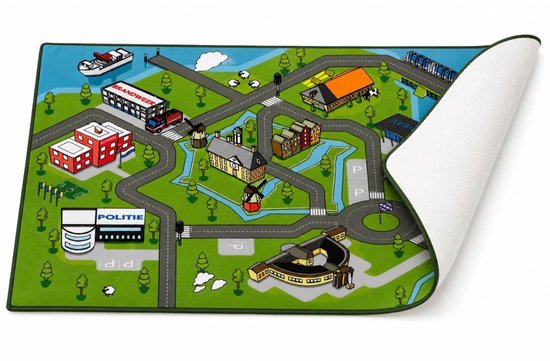Speelkleed met stadsplattegrond, wegen, gebouwen en water. De onderkant van het kleed is zichtbaar.