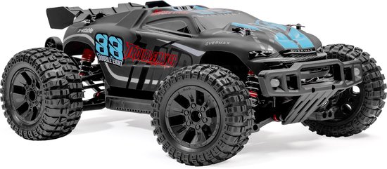 Zwarte RC monster truck met grote off-road banden, rode schokdempers en 'Troublemaker 88' opdruk.