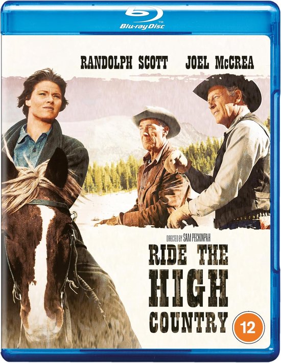 Randolph Scott en Joel McCrea op paarden in Ride the High Country, met in de verte heuvels en bomen.