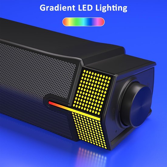 Close-up van de rechterkant van een zwarte soundbar met een draaiknop en gele LED-verlichting.