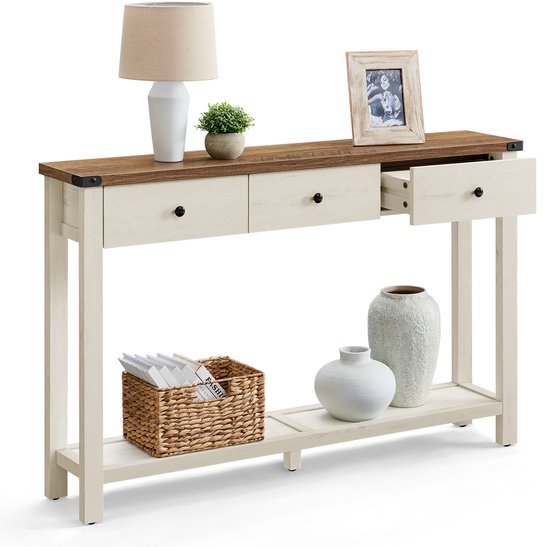Table console blanche à 3 tiroirs, plateau en bois et étagère, garnie de décorations et de paniers de rangement.
