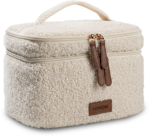 Crème teddy koeltas met ritssluiting, bruine lederen lipjes en label 'LUVION'.