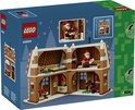LEGO Kerst Peperkoekhuis 40809, achterkant, met interieur en kerstman. Afmetingen 19.3cm x 11.6cm.