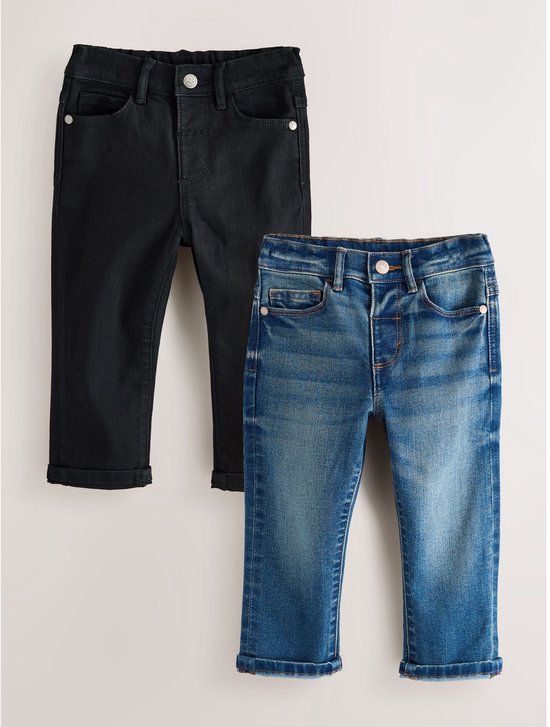 Twee spijkerbroeken, één zwart en één blauw, op een witte achtergrond.