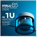 La Roche-Posay Hyalu B5 Suractivated Crème pot met blauwe en witte accenten. 'In 1U herstelt & maakt voller'.