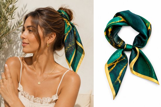 Dames sjaal in smaragdgroen en goud met marmerpatroon, gedragen als haarband door een model.
