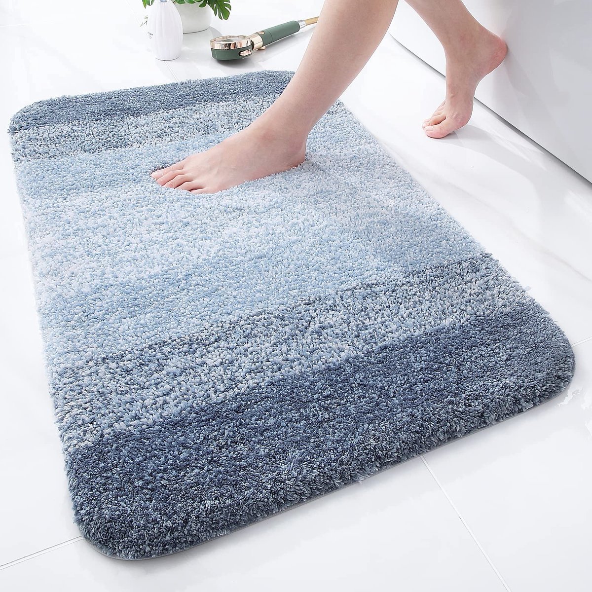 Dailygoods - Dailygoody - Zacht badkamertapijt - Antislip - Hoogpolig - Blauw - Wasbaar - Absorberend - Geschikt voor Binnen - 51x76 cm