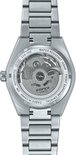 Achterkant van een zilverkleurig Edifice automatisch horloge met een transparante achterkant die het uurwerk toont.