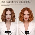 Voor-en-nafoto van een vrouw met rood haar. Voor: steile bob. Na: golvend bob met de Sansbeauté waver.