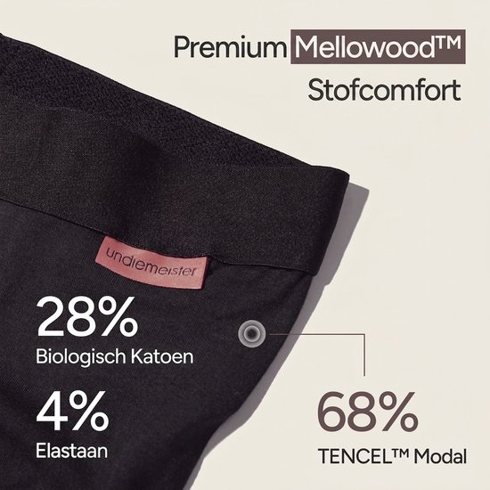 Detail van een zwarte boxer met TENCEL™ Modal, biologisch katoen en elastaan. Oranje label zichtbaar.