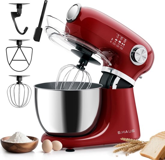Rode keukenmachine met RVS kom, diverse accessoires en ingrediënten zoals bloem, eieren en brood.