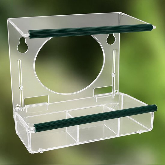 Transparante voerbak voor vogels met groene zitstokken en vakken voor voer.