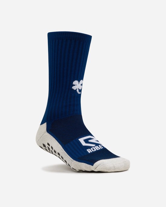 Donkerblauwe sok met witte symbolen en beige gripzool.