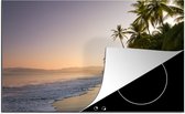 KitchenYeah® Inductie beschermer 80x52 cm - Strand - Zee - Palmboom - Kookplaataccessoires - Afdekplaat voor kookplaat - Inductiebeschermer - Inductiemat - Inductieplaat mat