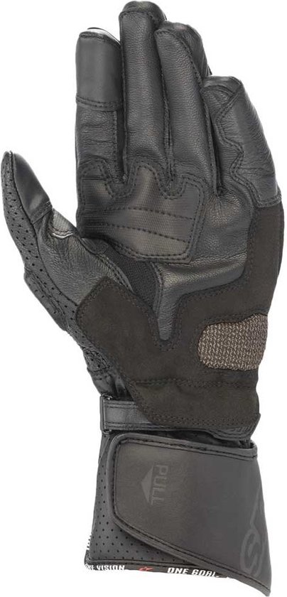 Zwarte Alpinestars motorhandschoen, palmzijde zichtbaar, met verstelbare polsband en "ONE GOAL" opdruk.