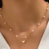 foto van Ketting met hartje en parel goud kleurig staal (2-delig) - Ketting met hanger dames goud kleurig staal hart en parels - Kettingen dames goudkleurig - Koppel meisjes ketting sieraden ketting