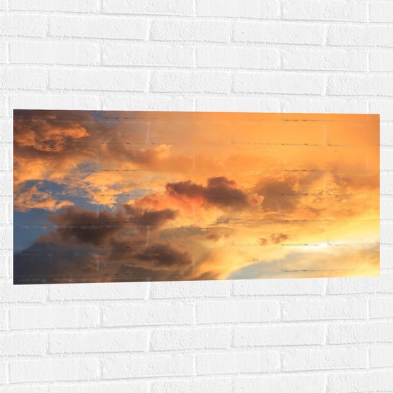 Muursticker - Zachtoranje Gloed over de Wolken in de Lucht - 100x50 cm Foto op Muursticker