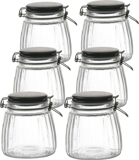 Six bocaux en verre côtelé avec couvercles noirs mats et fermetures à levier.