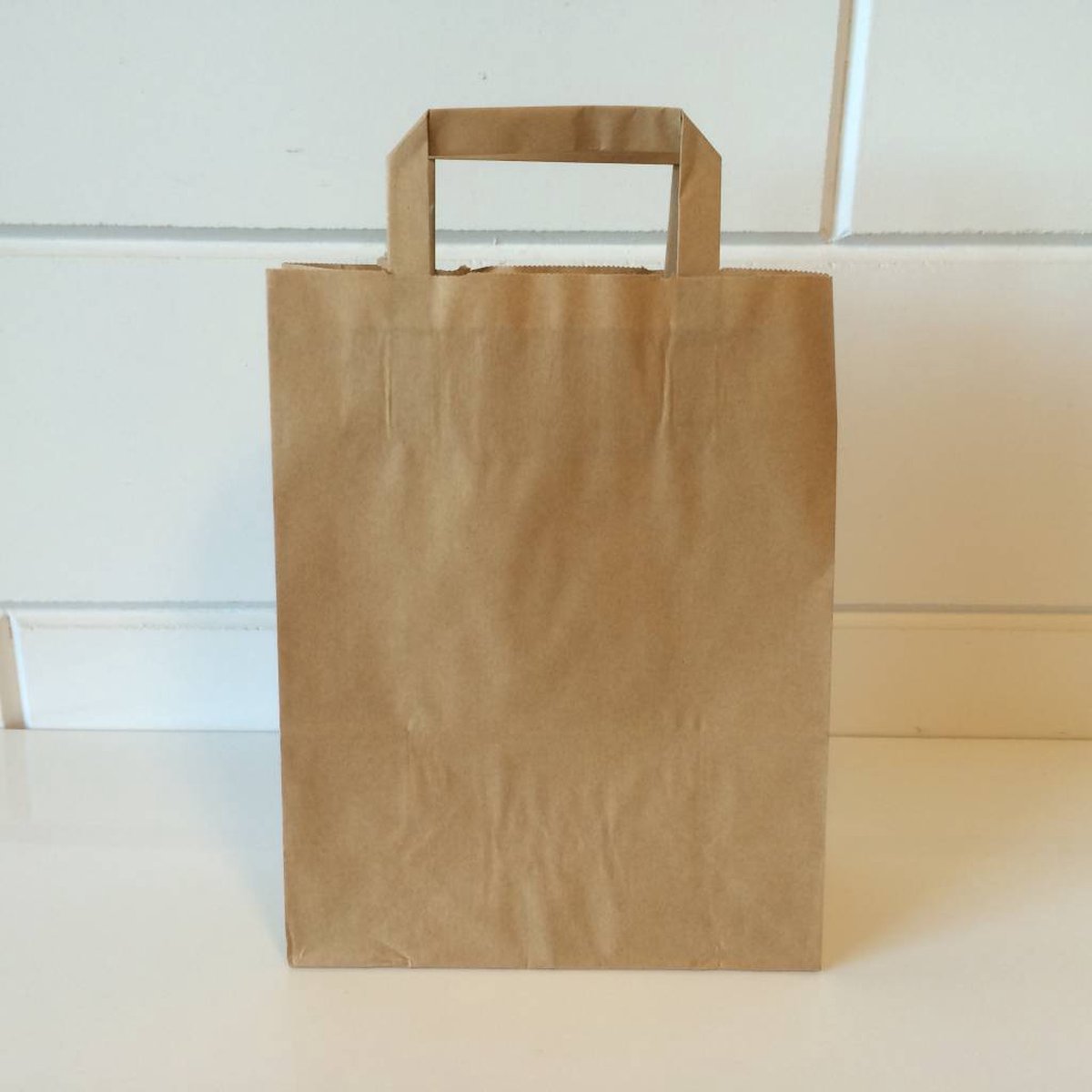 Goedkoopste Draagtassen bruin kraft 22/10x28 250st