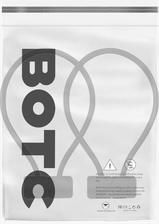 Emballage gris avec le texte BOTC en grandes lettres et un avertissement contre les risques d'étouffement.