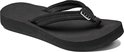 Zwarte Reef teenslipper met brede, gestikte band en dikke zool.