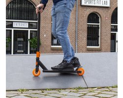 foto van RiDD Stunt Scooter Zwart - Stunt Step - Step - Zwart/Oranje - Vanaf 8 jaar - ABEC-7 - 100 mm Wielen - Metalen Rem - Black/Orange