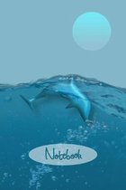 Dolphins Playing in Clear Water Notebook: This lovely notebook showcases these favourite marine animals which are often linked to whales. Inner pages