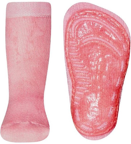 Roze antislip sokken, één met de gripzool van de voet zichtbaar.