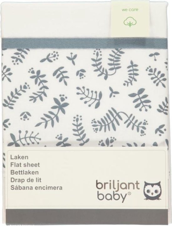 Verpakking van een wit ledikantlaken met blauwgrijze plantendecoratie en een blauwgrijze bies aan de bovenkant.