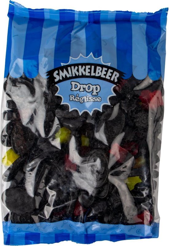 Zak Smikkelbeer Drop Réglisse met diverse stukjes snoep waaronder rode en groene snoepjes.