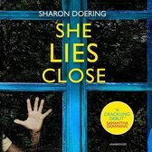 She Lies Close Lib/E