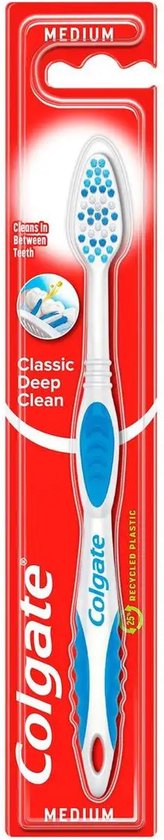 Brosse à dents blanche avec manche bleu, marquée 'Classic Deep Clean Medium' et 'Recycled Plastic'.