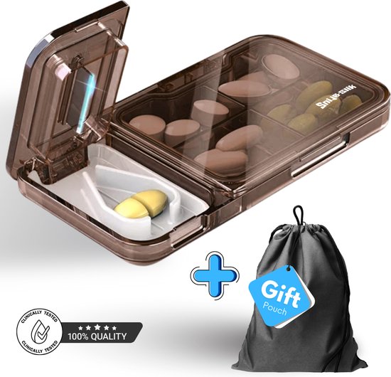 Boîte à pilules brun transparent remplie de pilules, avec un sac cadeau noir avec l'étiquette 'Gift Pouch'.
