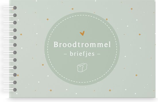 Een lichtgroen broodtrommel-boekje met witte en oranje stipjes. In het midden een groene cirkel met de tekst "Broodtrommel - briefjes -" en een broodje.