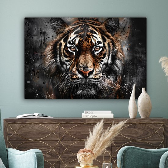 Portrait d'un tigre sur toile, accroché au-dessus d'un buffet.