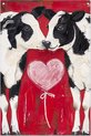 Deux vaches noires et blanches s'enlacent un cœur rose, peint en rouge.