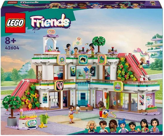 Boîte de LEGO Friends Centre Commercial avec 6 mini-poupées, un chariot à glaces et 2 toboggans. À partir de 8 ans.
